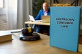Lawyer holds AUSTRALIAN CONSUMER LAW book. TheÃÂ Australian Consumer LawÃÂ sets outÃÂ consumerÃÂ rights that are calledÃÂ consumerÃÂ 